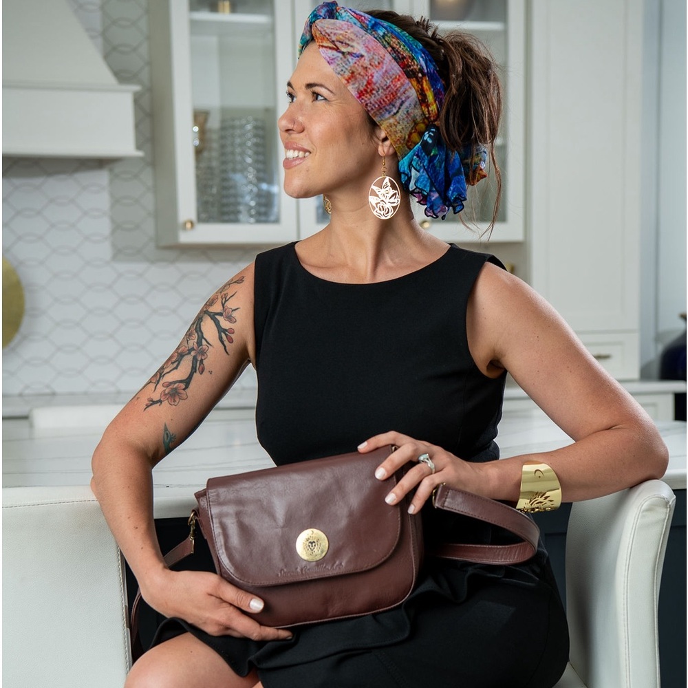 Brown Leather lion logo bag with Behold interior fabric
